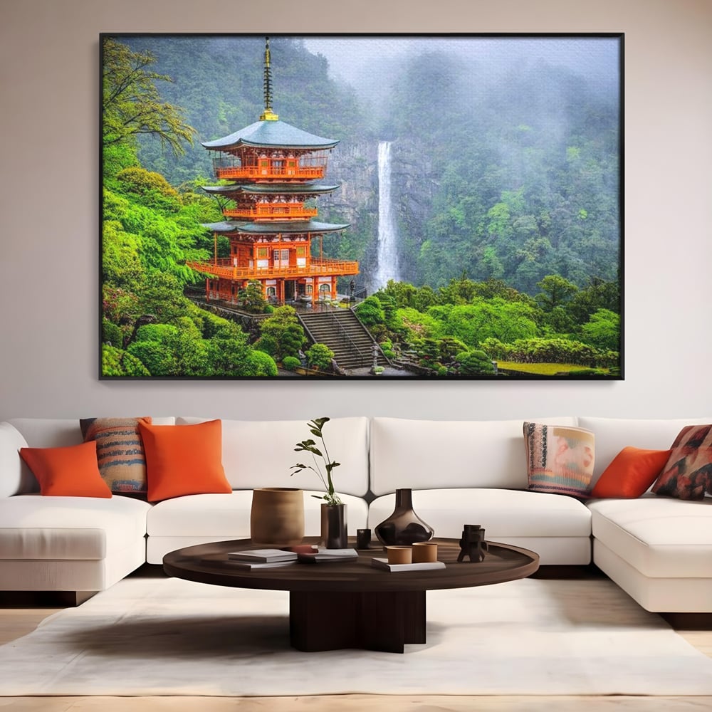 Tablou canvas cu tablou canvas cu pagoda si cascada, in rama de aluminiu negru, pe perete intr-un living